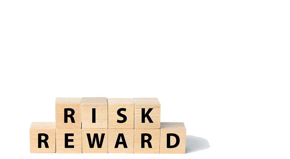 board game tiles arranged to spell risk reward